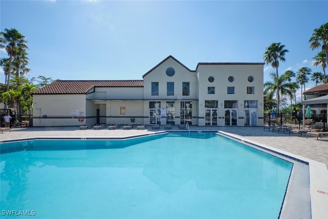 view of pool featuring a patio area