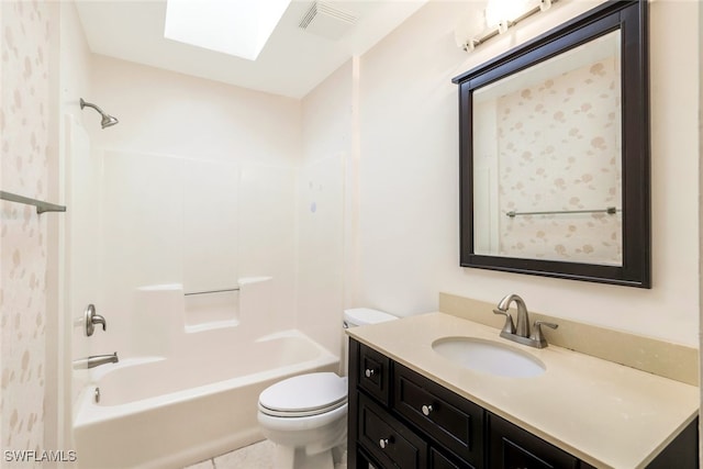 full bathroom featuring  shower combination, toilet, tile patterned flooring, and vanity