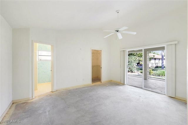 unfurnished room with vaulted ceiling and ceiling fan