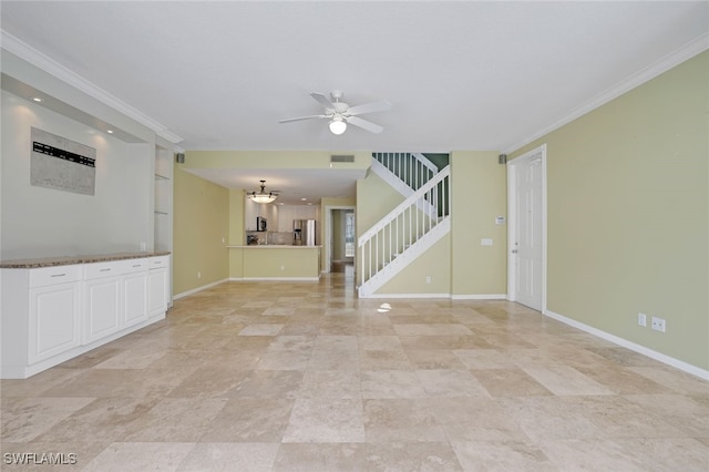 unfurnished living room featuring ceiling fan and ornamental molding