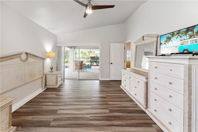 unfurnished bedroom with ceiling fan, lofted ceiling, access to outside, and dark hardwood / wood-style flooring