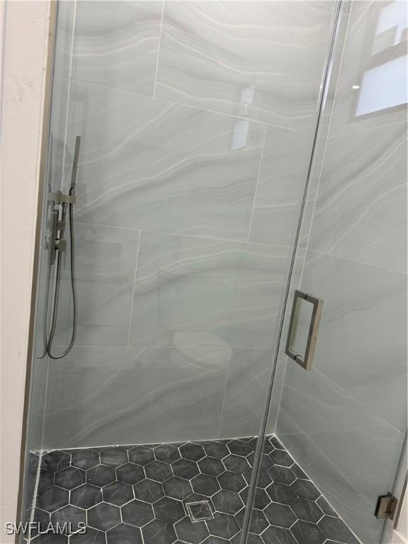 bathroom with an enclosed shower