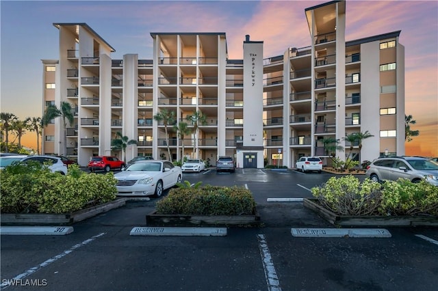 view of outdoor building at dusk