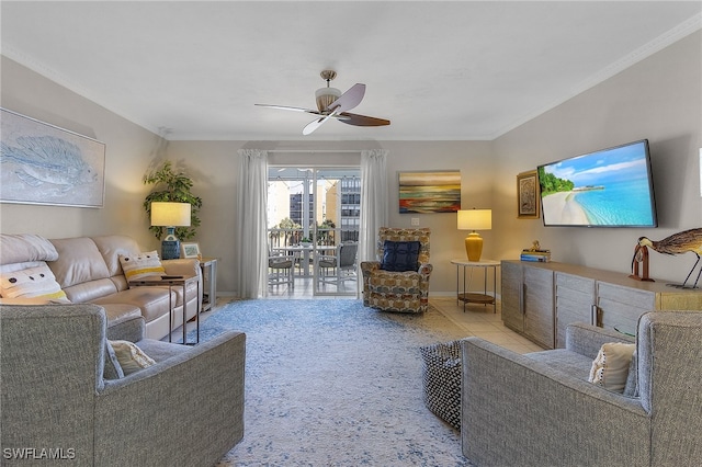 tiled living room featuring ornamental molding and ceiling fan