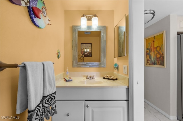 bathroom featuring tile patterned floors and vanity