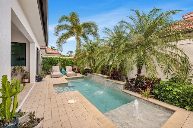 view of pool with a patio area and a fenced in pool