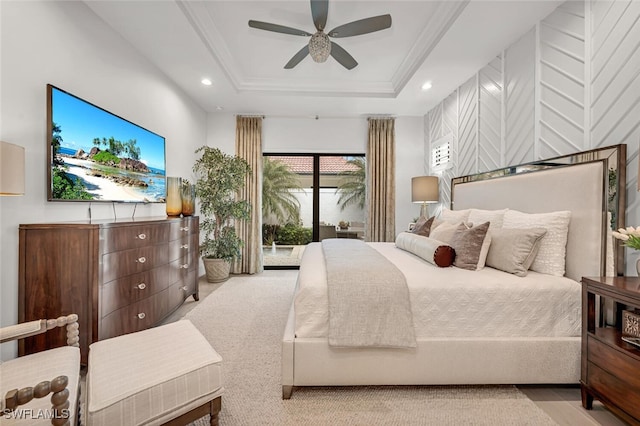 bedroom with recessed lighting, crown molding, a raised ceiling, and ceiling fan