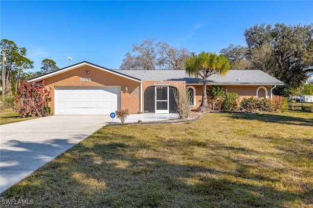 single story home with a garage and a front yard