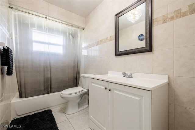 full bathroom featuring shower / tub combo with curtain, toilet, tile walls, vanity, and tile patterned flooring