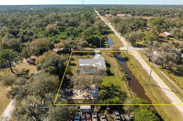 bird's eye view with a view of trees