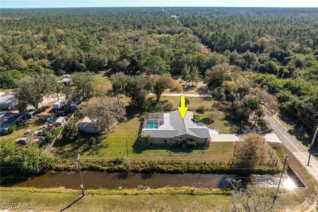 bird's eye view with a forest view