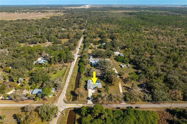 bird's eye view with a forest view