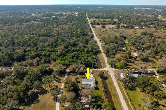 aerial view with a wooded view