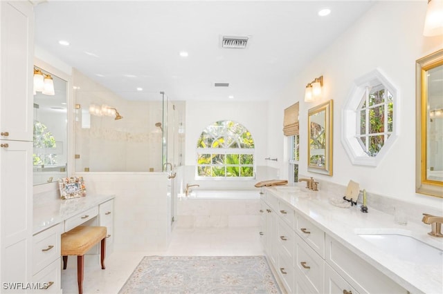 bathroom with vanity, tile patterned flooring, and separate shower and tub