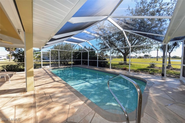 view of pool with a lanai and a patio area