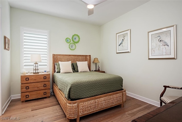 bedroom featuring ceiling fan and hardwood / wood-style floors