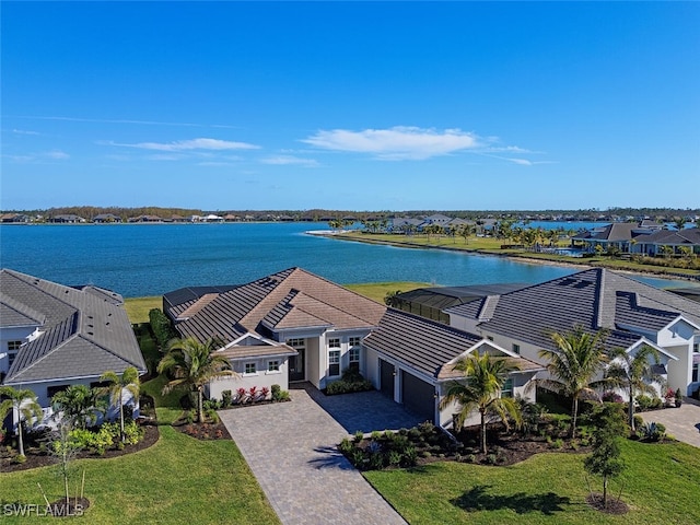 drone / aerial view featuring a water view