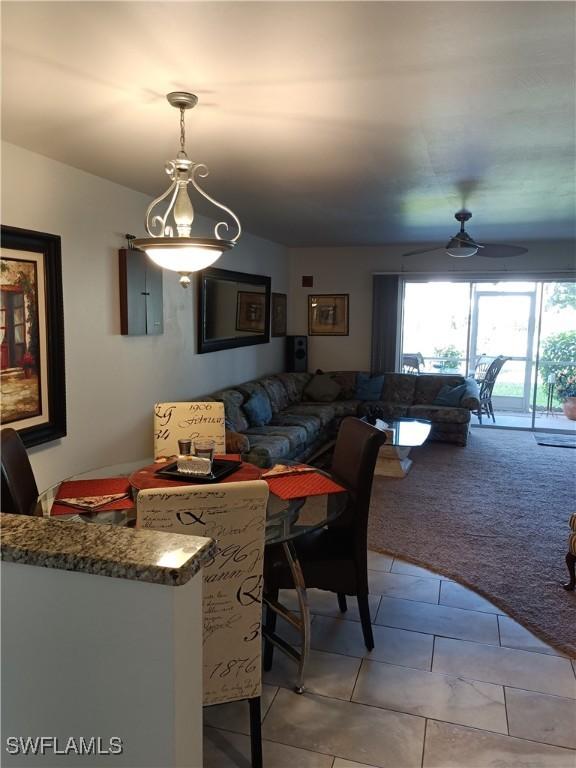 view of carpeted dining area