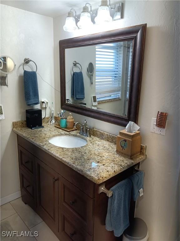 bathroom featuring vanity and tile patterned flooring