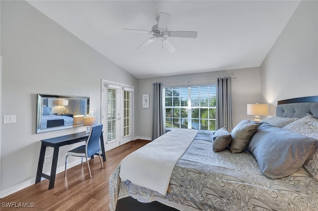 bedroom featuring hardwood / wood-style flooring, ceiling fan, access to outside, vaulted ceiling, and french doors