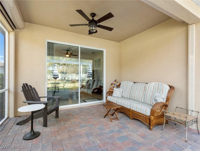 view of patio / terrace featuring ceiling fan