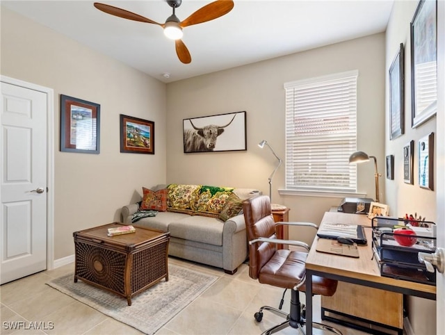 home office with ceiling fan and light tile patterned flooring