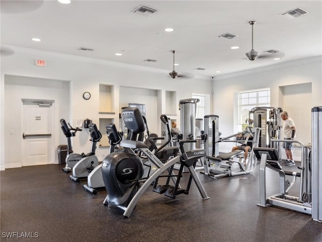 exercise room featuring ceiling fan, visible vents, and crown molding