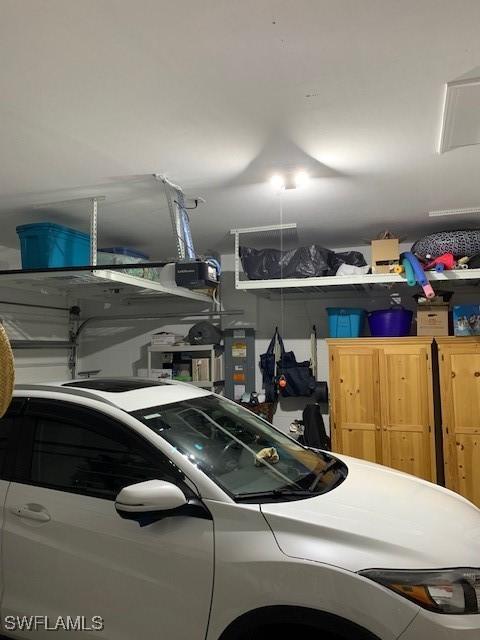 garage featuring a garage door opener