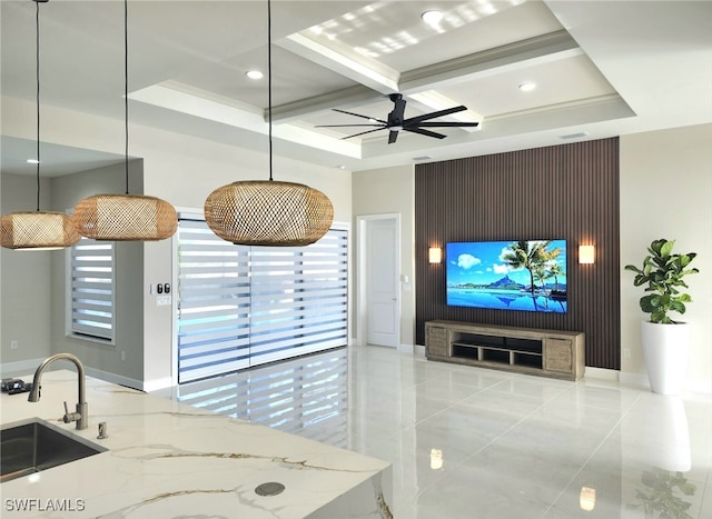 interior space featuring coffered ceiling, sink, and ceiling fan