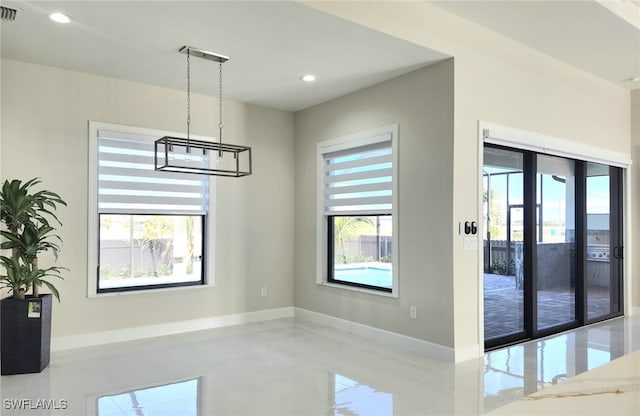 dining area with a wealth of natural light