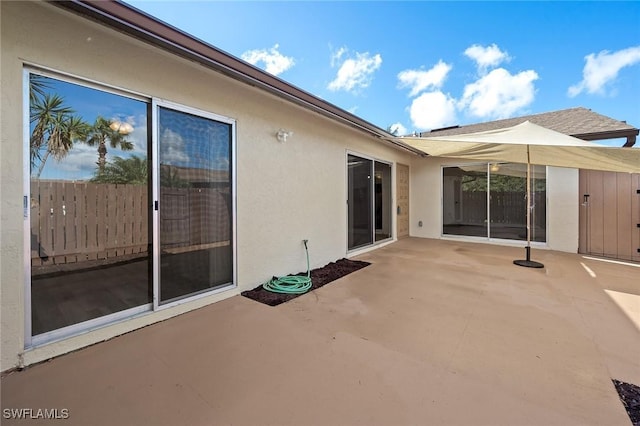 view of patio with fence