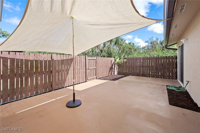 view of patio featuring a fenced backyard