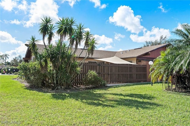 view of yard featuring fence