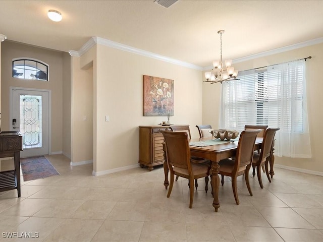 tiled dining area with crown molding and an inviting chandelier