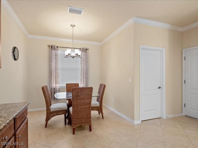 tiled dining area featuring an inviting chandelier and crown molding