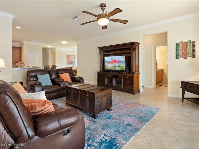 living room with crown molding, light tile patterned floors, and ceiling fan