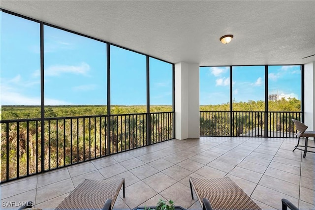 unfurnished sunroom with a wealth of natural light