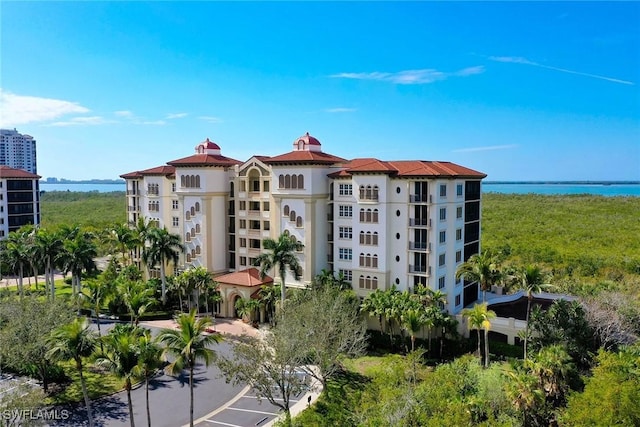 view of property with a water view