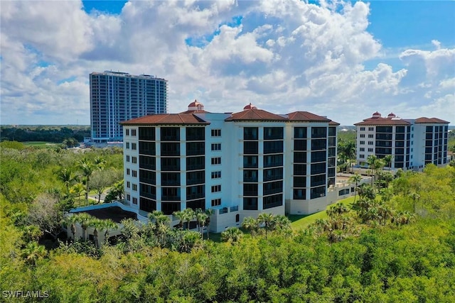 view of building exterior with central air condition unit