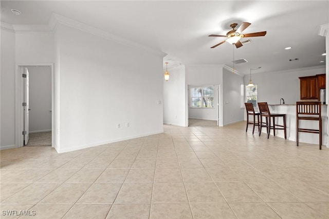 living room featuring light tile patterned floors, ornamental molding, and ceiling fan