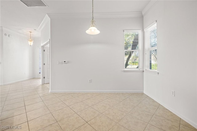 unfurnished room featuring crown molding and light tile patterned floors