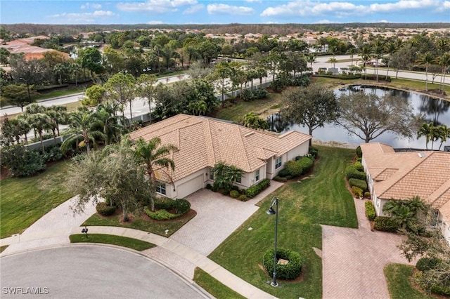 birds eye view of property featuring a water view