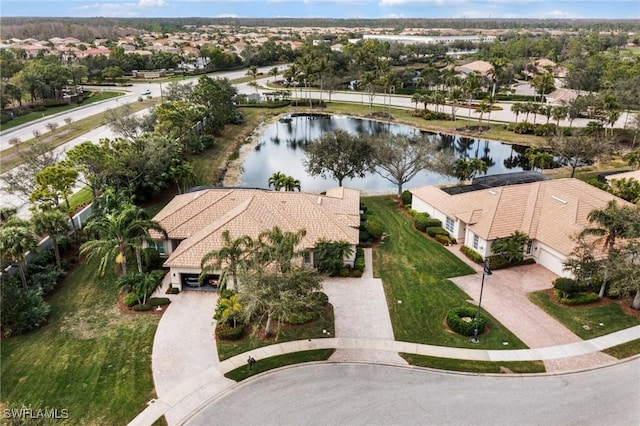 drone / aerial view with a water view