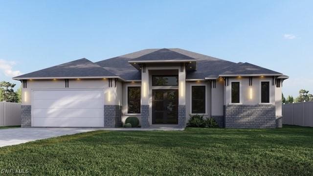 prairie-style house featuring a garage and a front yard