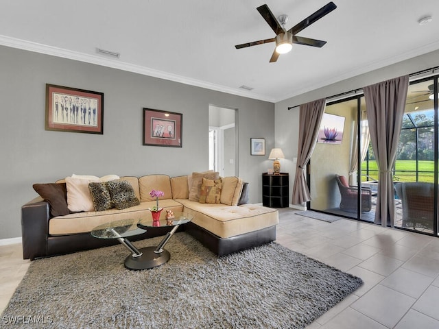 tiled living room with ornamental molding and ceiling fan