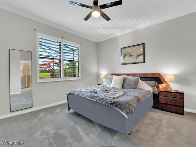 bedroom featuring crown molding, light carpet, and ceiling fan