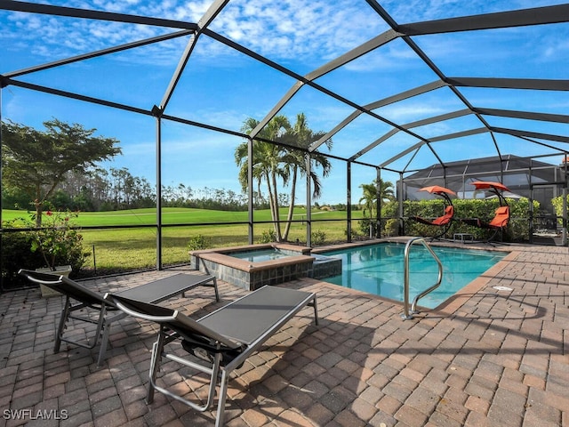 view of swimming pool featuring a patio area, an in ground hot tub, and glass enclosure