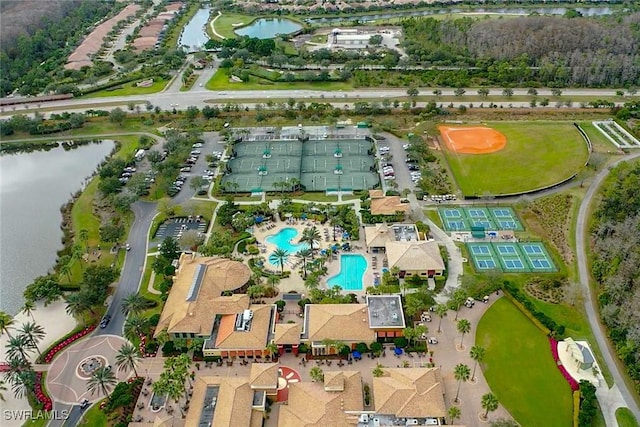 bird's eye view with a water view