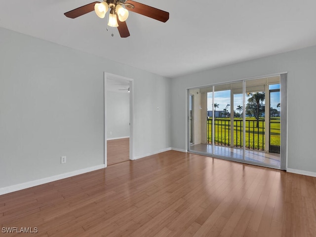 unfurnished room featuring ceiling fan and light hardwood / wood-style flooring