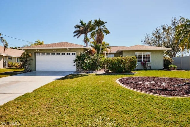 ranch-style home featuring a garage and a front lawn